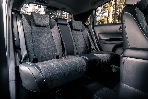 Magic Seats are carried over and improved. Cushions fold flat when either backrest is folded but also fold up to allow tall objects to be loaded via side doors