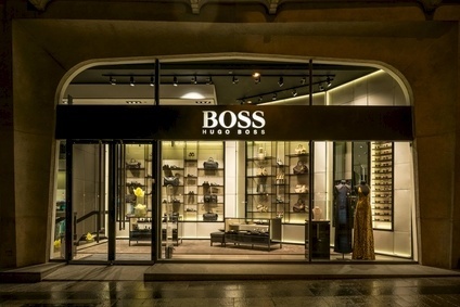 Hugo Boss cuts 2015 sales outlook 